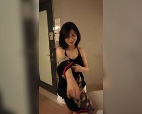 Asian woman stripping