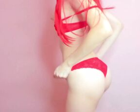 Dancing girl with red hair in beautiful lace red underwear