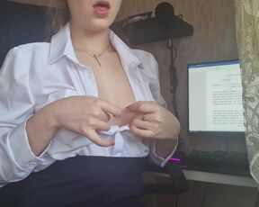 Dirty secretary fingering her boobs