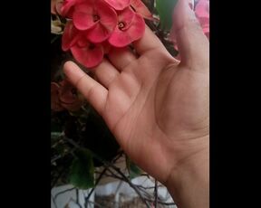 My hand on flowers