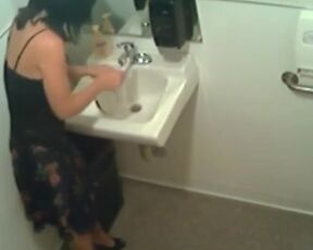 Kinky amateur pissing in restroom