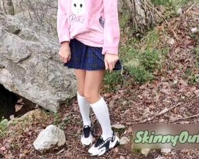 schoolgirl walking in the wood and show wet shaved pussy upskirt no panties outdoor