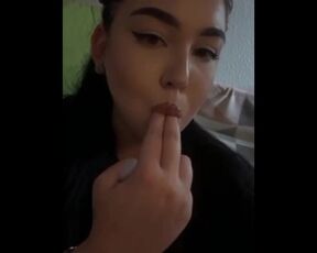 She loves to suck fingers and then caress her pussy